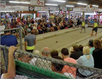  ?? PAUL DICICCO ?? Spectators observe the final match of the Cleveland Challenge Cup of Bocce at the Wickliffe Italian-American Club in 2016.