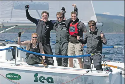  ?? Photograph­s courtesy of Marc Turner. ?? The crew of the Seaword celebrate their perfect regatta.