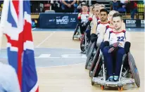  ??  ?? Flying the flag: Team GB wheelchair rugby team