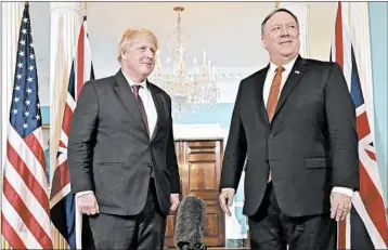  ?? CHIP SOMODEVILL­A/GETTY ?? British Foreign Secretary Boris Johnson, left, meets Monday in Washington, D.C., with Secretary of State Mike Pompeo.