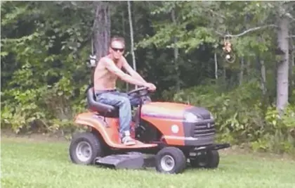  ?? ?? Peter Kaminski is shown mowing a neighbour's lawn in an undated photo. Kaminski was killed June 11, 2018, by Aurion Mustus, after an argument at a remote cabin on Lessard Lake, northwest of Edmonton, where Kaminski lived. Mustus, 24, was sentenced to seven years in the killing on Wednesday.