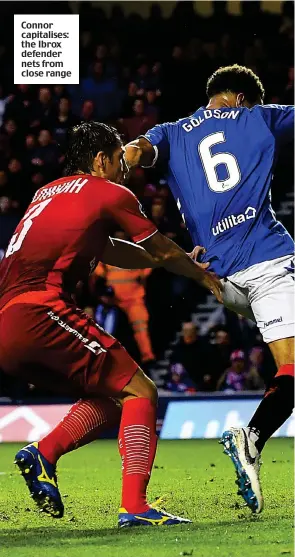  ??  ?? Connor capitalise­s: the Ibrox defender nets from close range