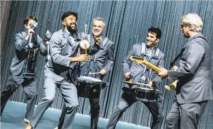  ?? MATTHEW MURPHY ?? From left: Tim Keiper, Gustavo Di Dalva, Stéphane San Juan, Daniel Freedman and David Byrne in the Broadway production of “American Utopia.” A film version of the show, directed by Spike Lee, will debut Oct. 17 on HBO and HBO Max.