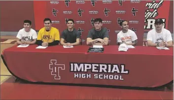  ?? COURTESY OF IMPERIAL ATHLETICS PHOTO ?? LEFT TO RIGHT: Imperial Tigers seniors Victor Valenzuela, Hector Gastelum, Seth Shaw, Aiden Shields, Deven Meza, and Zach Ray sign college football letters on intent on Wednesday, February 1, at the Tigers’ gym in Imperial.
