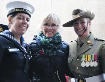  ??  ?? Marley Waiser, centre, at the Anzac Day ceremonies. Her two great uncles, never found, are memorializ­ed there.