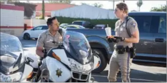  ?? PHOTO PETER IOVINO — WARNER BROS. ?? Shown from left, Michael Peña as Ponch And Dax Shepard as Jon.