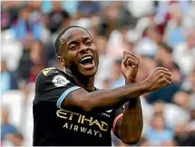  ?? AP ?? Harry Kane, left, scored two late goals to help Tottenham beat Aston Villa 3-1; Raheem Sterling, right, scored a hattrick in Manchester City’s 5-0 rout of West Ham as a new Premier League season began.