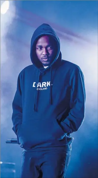  ?? David Wolff-Patrick Redferns via Getty Images ?? ON HIS Grammy-nominated “good kid, m.A.A.d. city,” Kendrick Lamar digs deep into Compton.