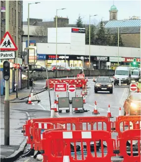  ??  ?? Some shopkeeper­s say they are being affected by the roadworks.