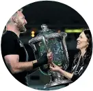  ??  ?? Prime Minister Jacinda Ardern hands the Bledisloe Cup to All Blacks captain Kieran Read – good, but not the World Cup.
