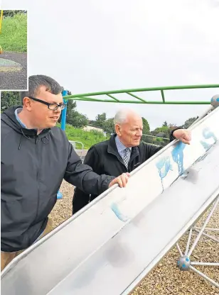  ??  ?? Simon Redmond and Ron Neave with some of the vandalised equipment.