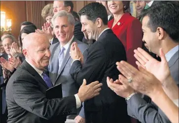  ?? Alex Wong Getty Images ?? R E P. Kevin Brady, left, shown last year, released the so-called Tax Reform 2.0 plan to a House panel Tuesday.
