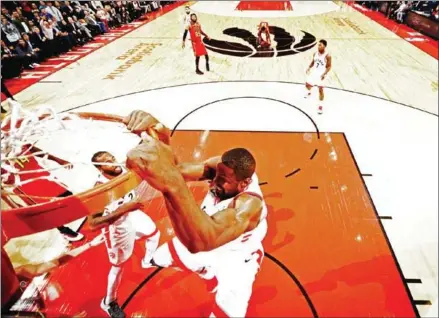  ?? RON TURENNE/NBAE/GETTY IMAGES/AFP ?? Serge Ibaka of the Toronto Raptors dunks to put Toronto Raptors ahead against the Atlanta Hawks on Tuesday at the Scotiabank Arena in Toronto, Ontario, Canada.