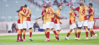  ??  ?? Galatasara­y players celebrate during the match against Neftçi in Baku, Azerbaijan, Sept. 17, 2020.