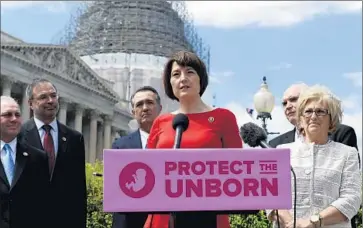  ?? Susan Walsh Associated Press ?? REP. CATHY McMorris Rodgers (R-Wash.) speaks at a May news conference on the so-called Pain-Capable Unborn Child Protection Act, which would ban late-term abortions. It passed the House along party lines.