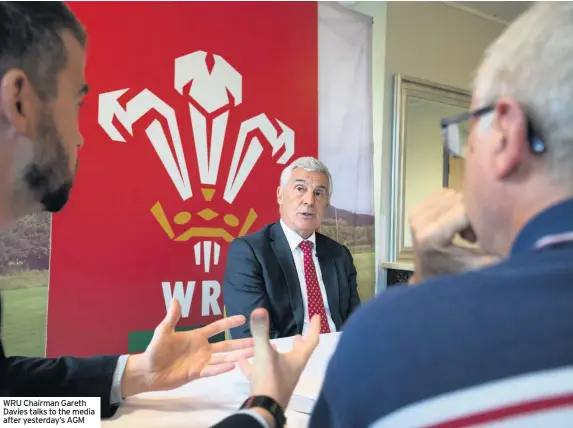  ??  ?? WRU Chairman Gareth Davies talks to the media after yesterday’s AGM