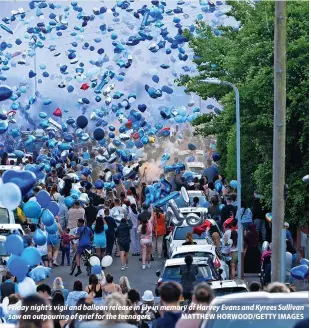  ?? MATTHEW HORWOOD/GETTY IMAGES ?? Friday night’s vigil and balloon release in Ely in memory of Harvey Evans and Kyrees Sullivan saw an outpouring of grief for the teenagers