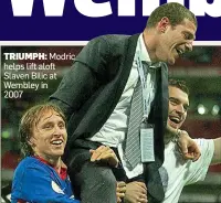  ??  ?? TRIUMPH: Modric helps lift aloft Slaven Bilic at Wembley in 2007