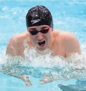  ?? RICK WOOD/MILWAUKEE JOURNAL SENTINEL ?? Ben Hayes of Brown Deer/University School competes in the 200-yard individual medley Friday at the state meet. Hayes won in 1 minute 50.28 seconds.