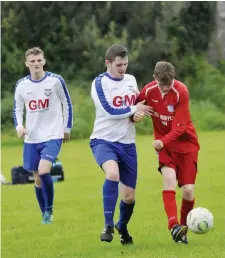  ??  ?? Kyle Hargadon of Merville and Michael Barry, Aughanagh Celtic.