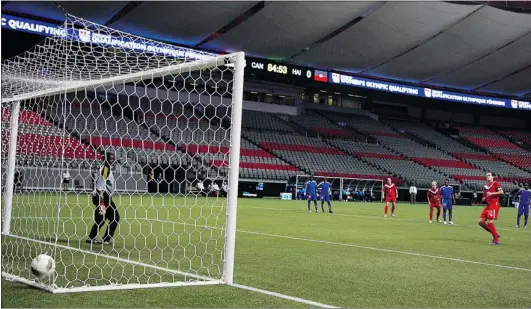  ?? JEFF VINNICK/ GETTY IMAGES ?? Canada’s Christine Sinclair scores on a penalty kick against Haiti on Thursday. With attendance announced at 7,627, the off- camera side of BC Place was empty.