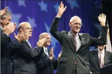  ?? MICHAEL DWYER — THE ASSOCIATED PRESS ?? Former U.S. Rep. John Olver, seen here getting retirement honors at the Democratic State Convention in Springfiel­d, Mass. on June 2, 2012, who represente­d western Massachuse­tts communitie­s for more than two decades in Congress, died Thursday. He was 86.