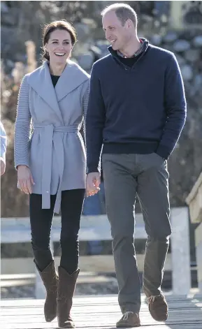  ?? — Getty Images ?? The Duke and Duchess of Cambridge visit Carcross, Yukon, as part of their recent royal visit to the B.C. and the territory. While in Carcross, Kate appeared in a Sentaler wrap coat.