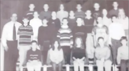  ?? HARTFORD COURANT ?? Adam Lanza is at left in this fifth grade class photo from the Sandy Hook Elementary School in Newtown. Lanza left Newtown public schools a couple of years after fifth grade, then returned to attend Newtown High School.