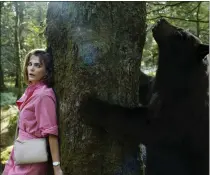  ?? COURTESY OF UNIVERSAL PICTURES ?? Keri Russell in a scene from “Cocaine Bear,” directed by Elizabeth Banks.