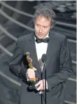  ??  ?? Laszlo Nemes accepts the award for best foreign language film for Son Of Saul.