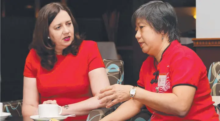  ?? Pictures: BRENDAN RADKE ?? TALKS: Queensland Premier Annastacia Palaszczuk with Lai Chu Chan of the Cairns and District Chinese Associatio­n Incorporat­ed (CADCAI) at Brothers Leagues Club, Manunda.