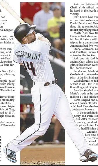  ?? AFP ?? Paul Goldschmid­t of the Arizona Diamondbac­ks hits a three-run home run during the bottom of the first inning of the National League Wild Card game against the Colorado Rockies at Chase Field in Phoenix, Arizona.