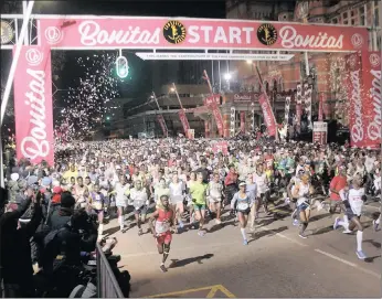  ?? PICTURE: GCINA NDWALANE/AFRICAN NEWS AGENCY(ANA) ?? Thousands of runners get into gear despite chilly conditions at the start of the Comrades Marathon in Pietermari­tzburg yesterday