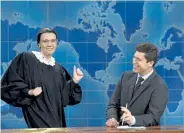  ?? Will Heath, NBC ?? Kate McKinnon as Supreme Court Justice Ruth Bader Ginsburg with Colin Jost during Weekend Update on “Saturday Night Live” in 2016.