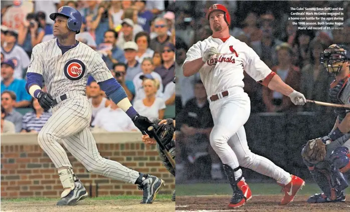  ?? AP PHOTOS ?? The Cubs’ Sammy Sosa (left) and the Cardinals’ Mark McGwire engaged in a home-run battle for the ages during the 1998 season. Both broke Roger Maris’ old record of 61.