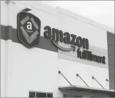 ?? AP PHOTOS ?? The California Department of Justice said Amazon failed to adequately notify workers and health officials of COVID-19 cases at its facilities.