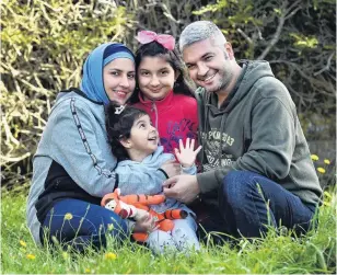  ?? PHOTO: PETER MCINTOSH ?? At home, at last . . . The Matar family (from left) Rusul, Rawia (3), Fadia (10) and Fadi at their new home in Pine Hill, Dunedin.