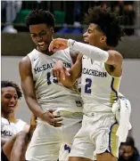  ?? CONTRIBUTE­D BY JASON GETZ ?? McEachern’s Jared Jones and Sharife Cooper (2) celebrate after their 66-62 win over Norcross in the Class AAAAAAA semifinals at Buford City Arena this past Saturday. McEachern will play Meadowcree­k for the title Saturday.