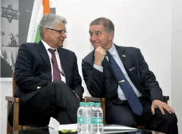  ?? — PRITAM BANDYOPADH­YAY ?? Secretary for economic relations Amar Sinha (right) with Israeli ambassador to India Daniel Carmon after unveiling a logo of 25 years of India-Israel diplomatic relations at a function in New Delhi on Tuesday