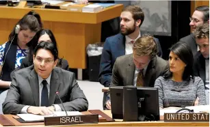  ?? (Evan Schneider/UN) ?? AMBASSADOR DANNY DANON addresses the UN Security Council yesterday alongside US Ambassador Nikki Haley.