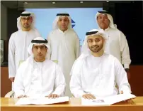  ?? Wam ?? representa­tives from the Abu Dhabi national hotels Company and Sandooq Al Watan during the agreement signing in Capital. —