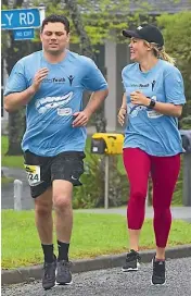  ?? PHOTOS: LIAM COURTENAY ?? Married at First Sight couple Brett and Angel Renall were among almost 1500 people who took part in the annual race, walk and relay around Mt Taranaki.