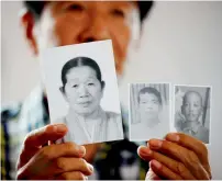  ?? Reuters ?? a man shows pictures of his deceased mother and little brothers living in North Korea, in Sokcho, South Korea. —