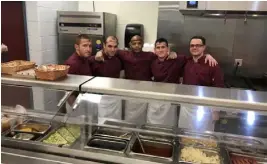  ?? Photo: Matt Higley ?? Kitchen workers in the Utah County Jail.