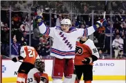  ?? DERIK HAMILTON — THE ASSOCIATED PRESS ?? The Rangers’ Matt Rempe celebrates after scoring past Flyers goaltender Samuel Ersson during the third period on Saturday in Philadelph­ia.