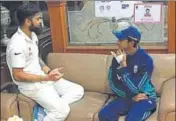  ?? BCCI ?? Kohli with Hameed outside the Mohali dressing room.