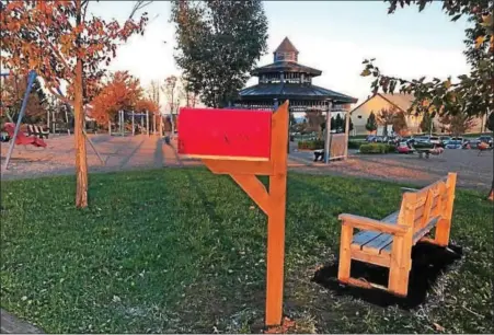  ?? COURTESY OF CYNDI TROMBLEY ?? The red mailbox is now installed at Amity Community Park.