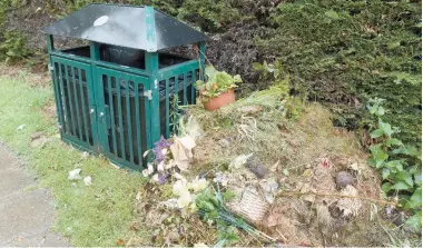  ?? ?? Questions have been raised over the standard of maintenanc­e at Braywick Cemetery, including complaints over piles of grass cuttings. Ref:134474-6