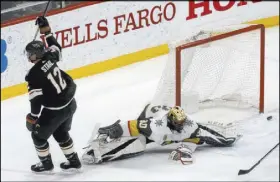  ?? Jim Mone The Associated Press ?? Minnesota’s Eric Staal, scoring against Malcolm Subban of the Knights in a February game, has 37 goals and is in the converatio­n for the Hart Trophy as the league’s MVP.