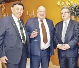  ??  ?? Your columnist with Ambassador­s David Strachan of New Zealand and Nicolas Galey of France.